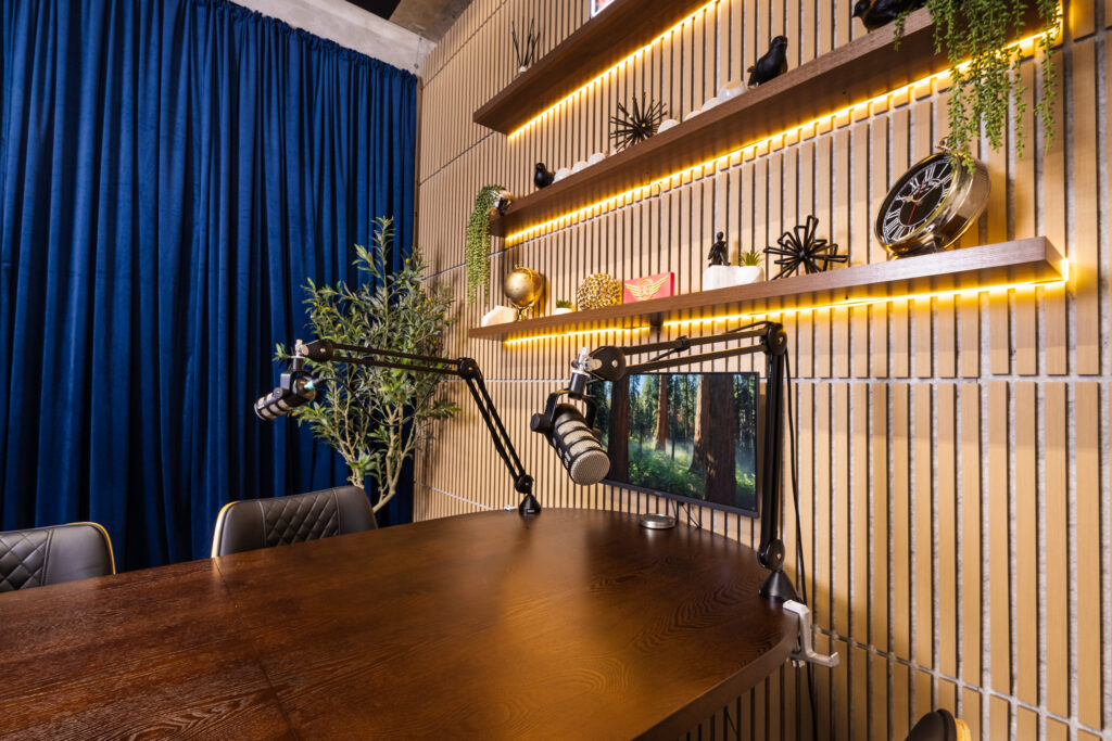 band-barracks-podcast-room-109-rode-podmic-boom-arms-monitor-led-shelves