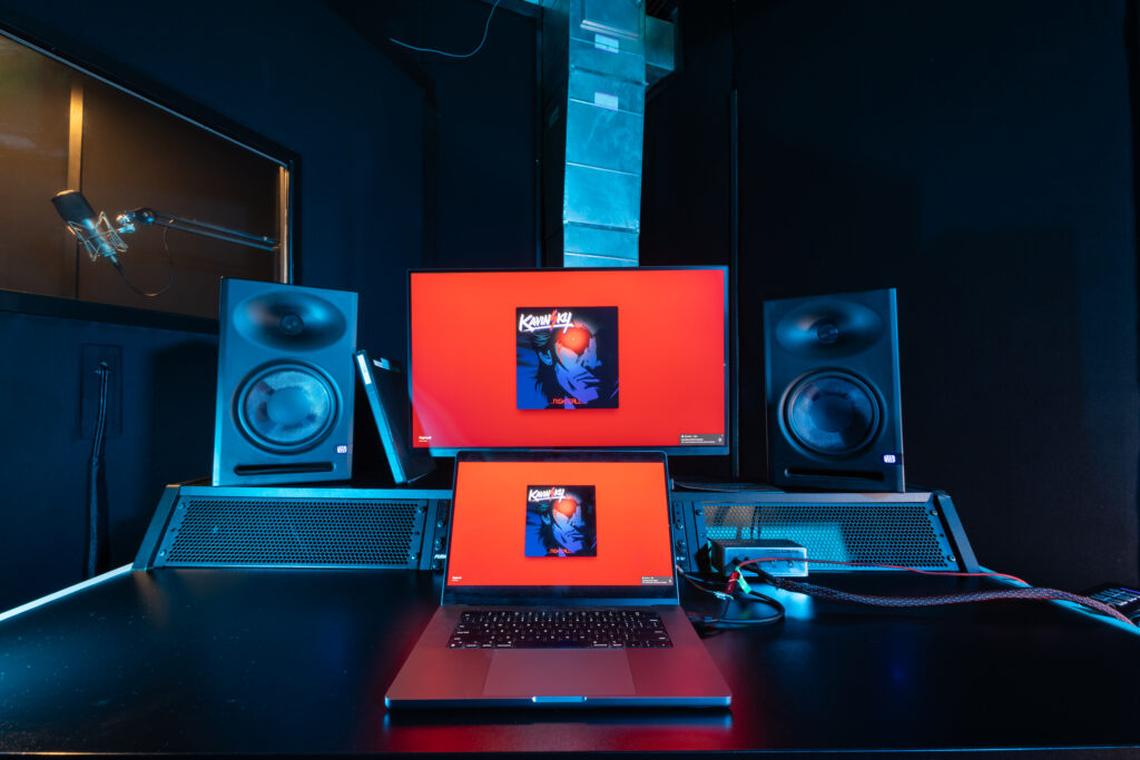 band-barracks-recording-room-119-control-desk-studio-monitors-laptop-vocal-booth